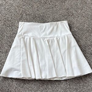White tenis/gold skirt built in shorts